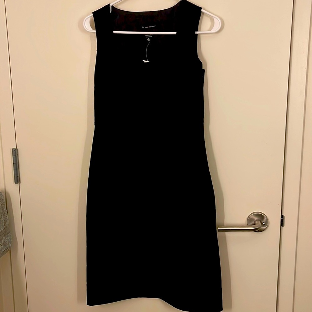 New with tags, black shift dress.